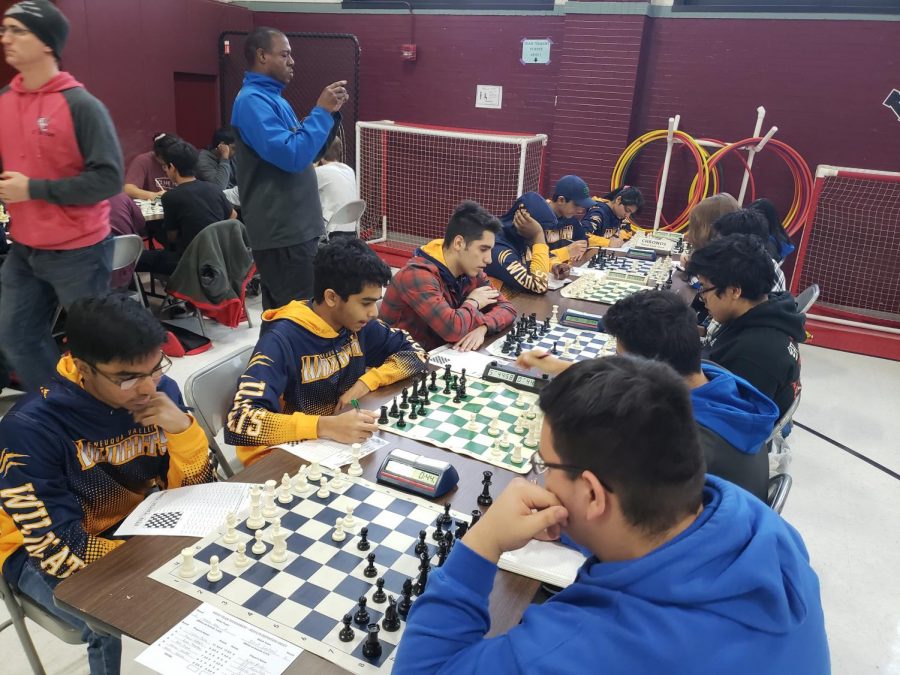 Concentration flooded the faces of one of the chess club teams during a chess tournament at Agro High School in Summit, Illinois. Left to Right: Vikram Dara, Pranav Addepalli, Younis Nooraldeen, Rohit Pissipotti, Abinav Shankar, Neelu Nerella. Courtesy of James Fox.
