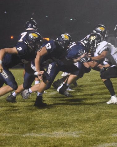 Junior Sam Jourdan, middle, Neuqua Valley Jv football player.