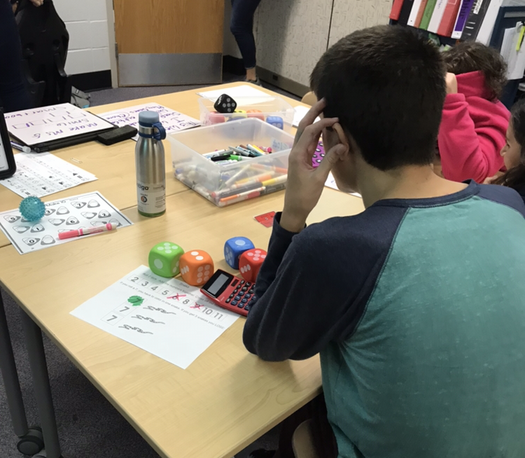 A student working on regular PACE activities. Students utilize special materials to make their learning environment more accommodating.