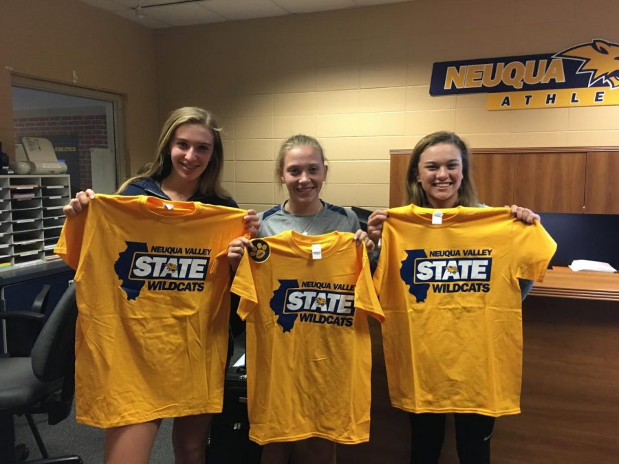 Listed from left to right: Hanna Beck, Hannah Neuman, and Jessica Chivini. The 2017 girls varsity tennis players receiving their shirts before heading to state. Chivini is the only one of the three players who trains at Acceleration, while Beck and Neuman opted to not take part in the program and were still able to secure a spot at state. Photo courtesy of Jessica Chivini.