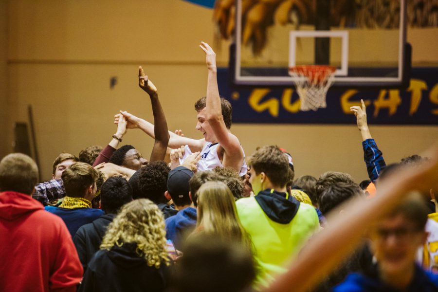 The Neuqua Valley Gold Rush section Waubonsie Night (2/7/2020). Pictured is Connor Davis being carried after the game winning shot. 