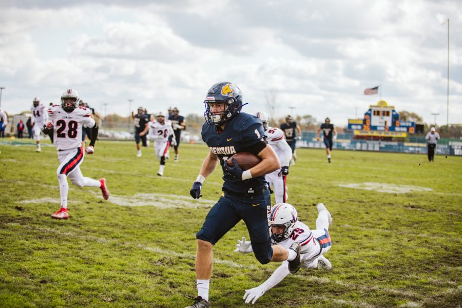  Pictured is Patrick Hoffman playing at home as Neuqua Valley’s wide receiver. Photo courtesy of Jason Verdin. 

