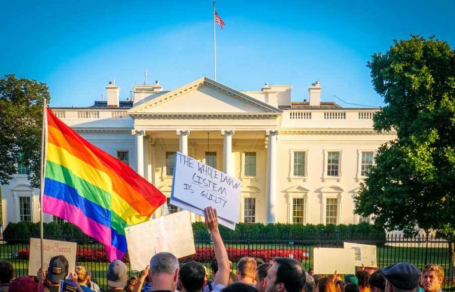 Protesters outside the White House after Trump’s decision to allow LGBTQ+ discrimination from taxpayer-funded groups. These groups include homeless shelters, child-placing agencies and more.