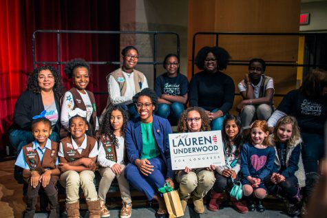 Representative Lauren Underwood photographed with girl scouts that came in support at the ceremonial swearing in event at Neuqua Valley in 2019.