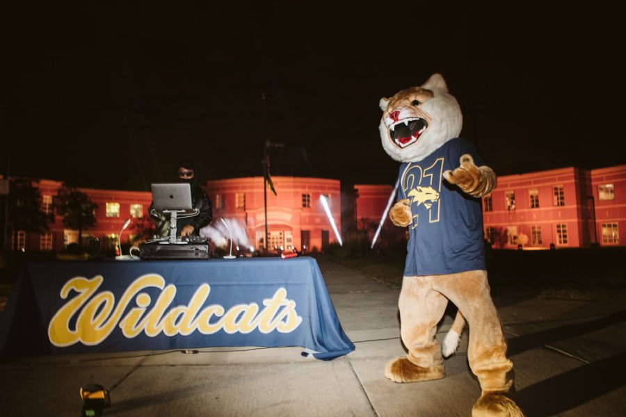 Willie the Wildcat dancing along with the DJ at the senior car parade. Scroll for more pictures.