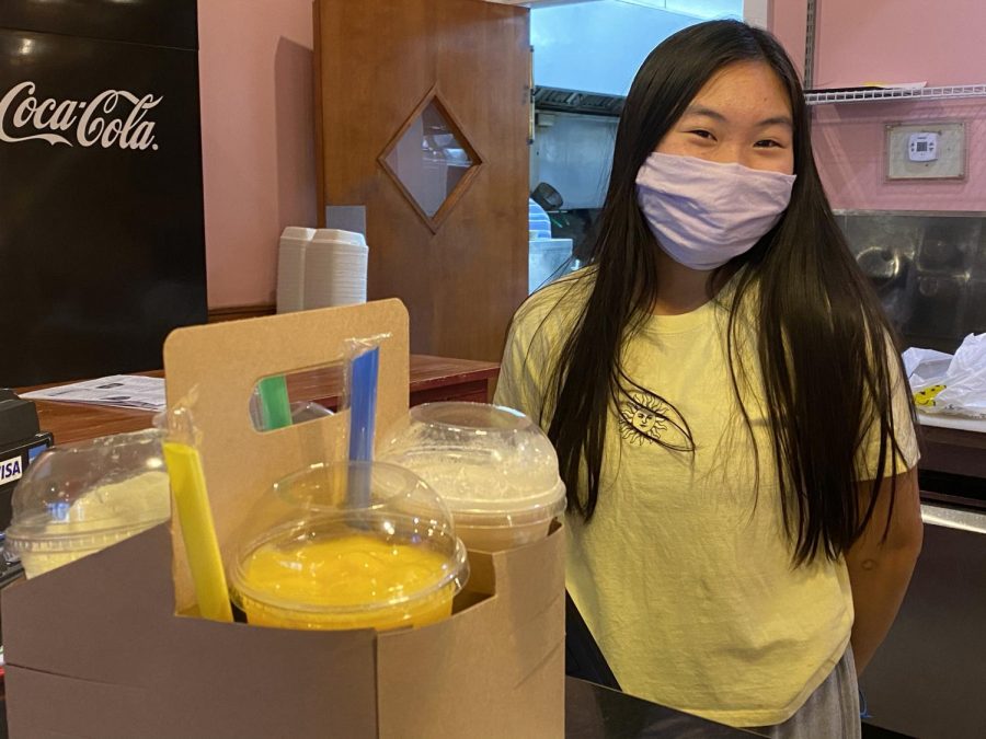 Huynh serving boba smoothies at Noodles Pho U. She started working here in mid-October of 2020. 