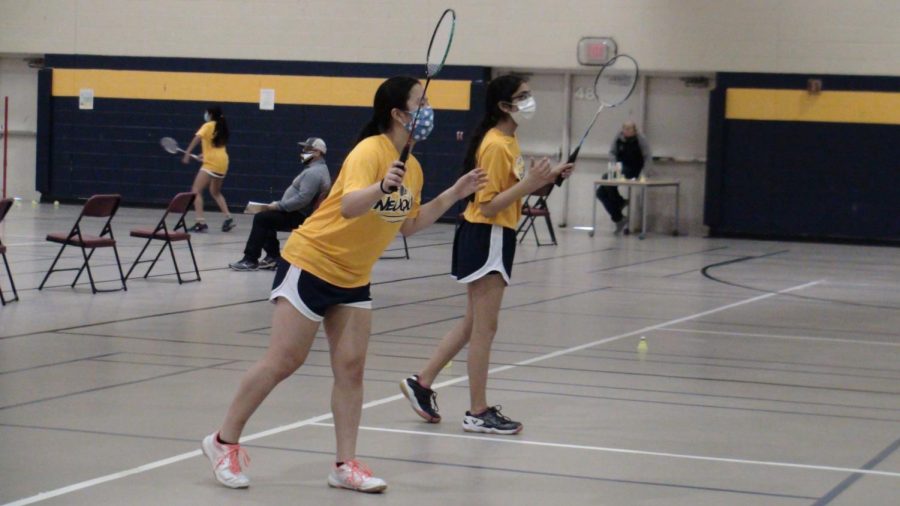 JV+team+captains+Karena+Liang+%28left%29+and+Preena+Shroff+%28right%29+getting+ready+to+return+in+their+doubles+match