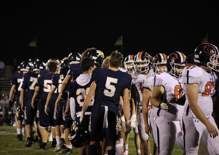 Neuqua Valley and Oswego conclude their game with mutual respect.