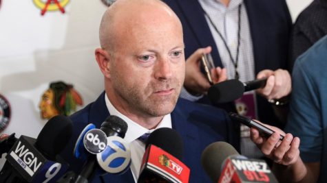 Chicago Blackhawks GM Stan Bowman answers to reporters after the Blackhawks sexual assault scandal reaches the light.