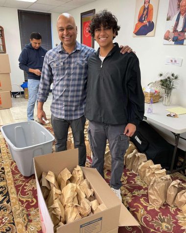 Anaam Singh and the head of Seva Circle making and packing kits to donate